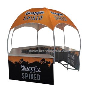 Printed dome promotional kiosk with curved metal uprights, arched openings and perimeter counters