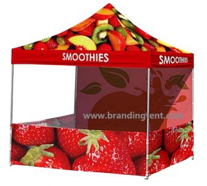 Peaked promotional canopy with fruit graphics on the roof, back wall and half-height side panels