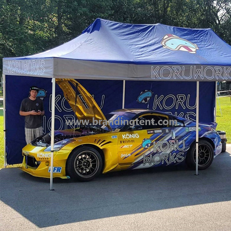 Custom 3x6m pop-up canopy tent with printed walls at an outdoor car show event