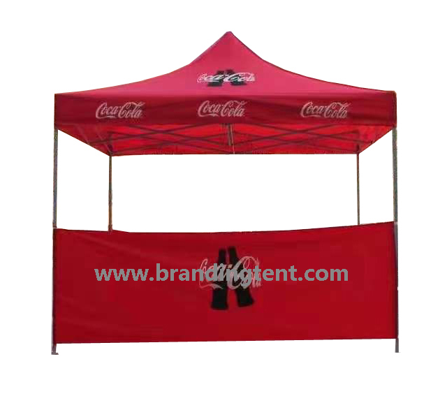 Red branded pop-up gazebo tent set up as a food and drink stand