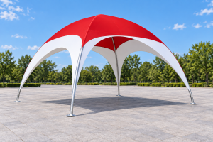 Complete red and white event canopy supported by slim curved metal frame members