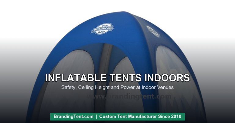 Inflatable tent indoors - blue inflatable dome set up at an indoor exhibition venue
