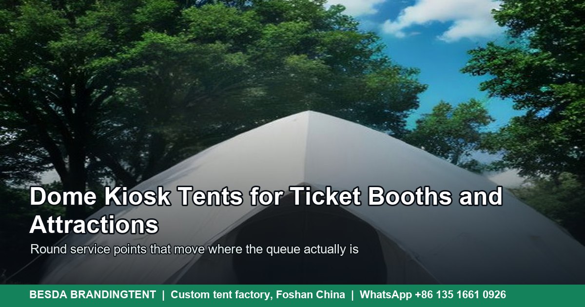 White dome tent with curved round roof and open entrance standing on a visitor site lawn