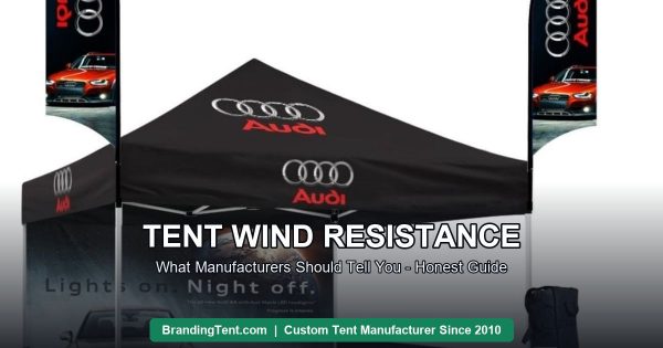Custom printed event tent kit with feather flags and matching table cover installed outdoors