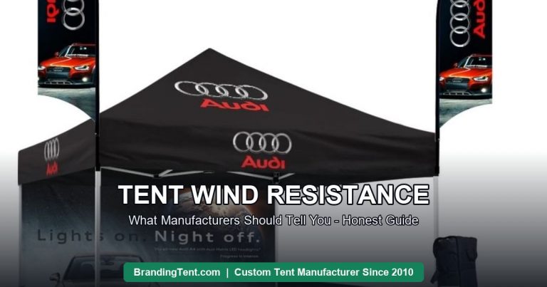 Custom printed event tent kit with feather flags and matching table cover installed outdoors