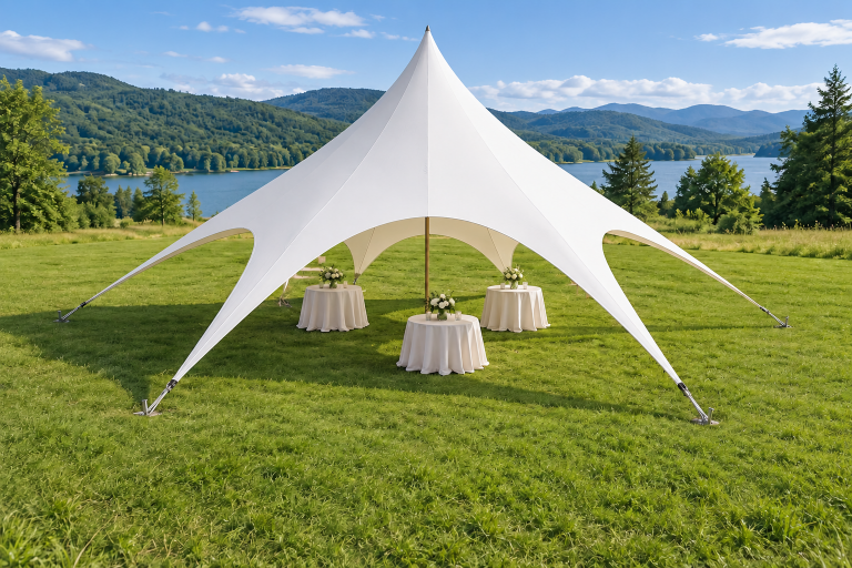 Complete white single-center-pole star canopy with reception tables and perimeter attachment points